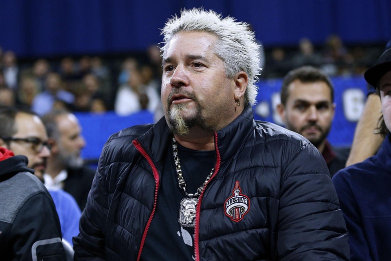 NEW ORLEANS, LA - FEBRUARY 17: Guy Fieri reacts during the NBA All-Star Celebrity Game at the Mercedes-Benz Superdome on February 17, 2017 in New Orleans, Louisiana. NOTE TO USER: User expressly acknowledges and agrees that, by downloading and or using this photograph, User is consenting to the terms and conditions of the Getty Images License Agreement. (Photo by Jonathan Bachman/Getty Images)